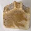 Savon artisanal Racine de Lumière beige et doré, vue de face, marbré.