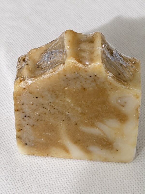 Savon artisanal Racine de Lumière beige et doré, vue de face, marbré.